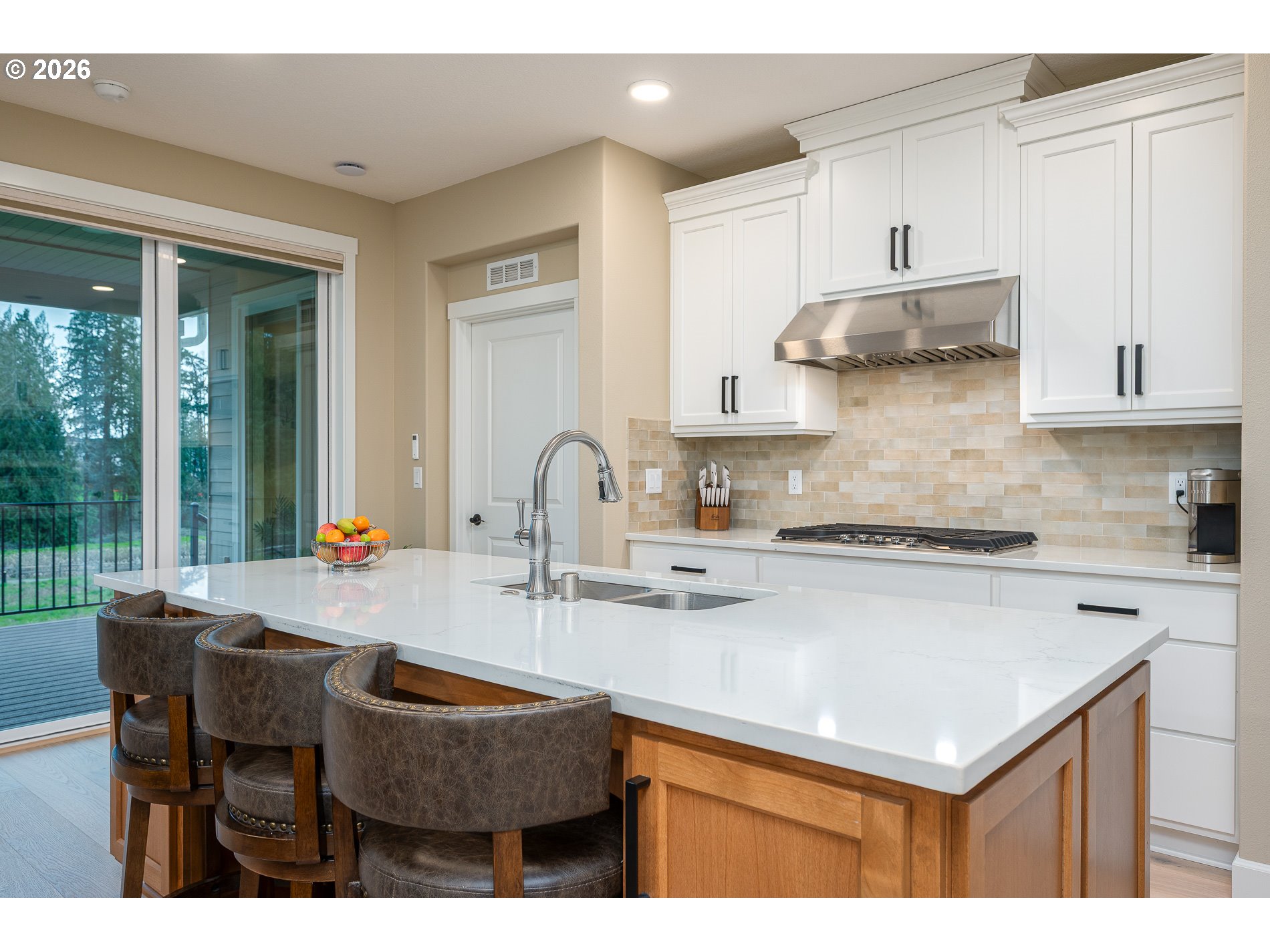 Undisclosed Address Ridgefield, WA 98642 - Photo 9 of 46 a kitchen with stainless steel appliances granite countertop a sink a stove and a refrigerator