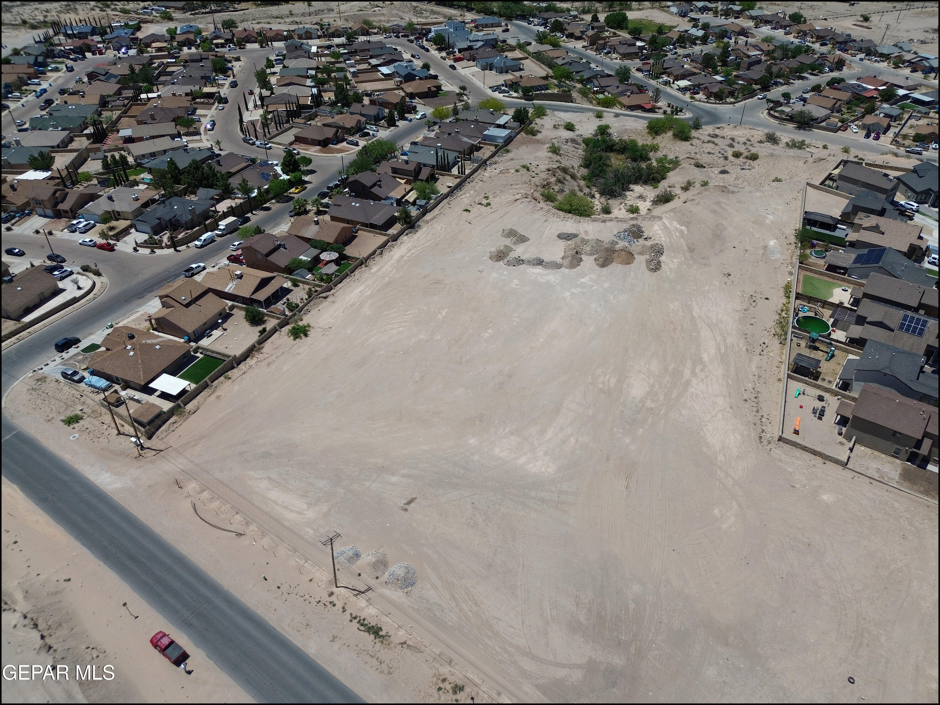 10696 Stockyard Drive Socorro, TX 79927 - Photo 6 of 7 an aerial view of a house with a yard