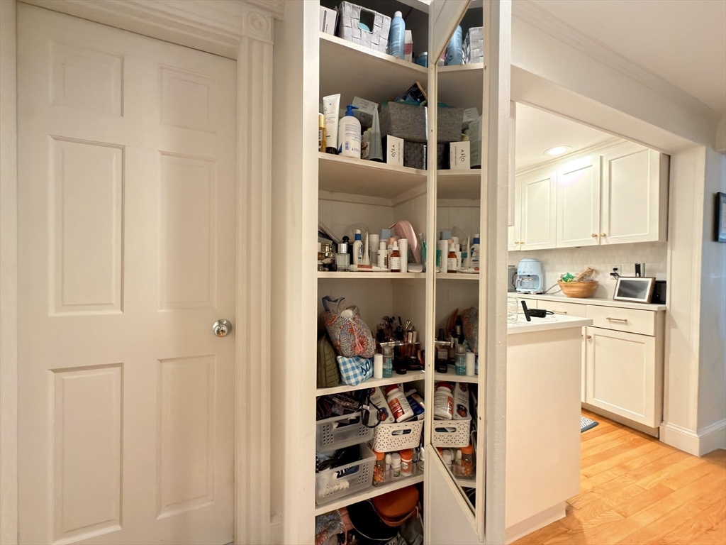 41 Pinckney Street, Unit B Boston, MA 02114 - Photo 15 of 31 a kitchen with a refrigerator and cabinets