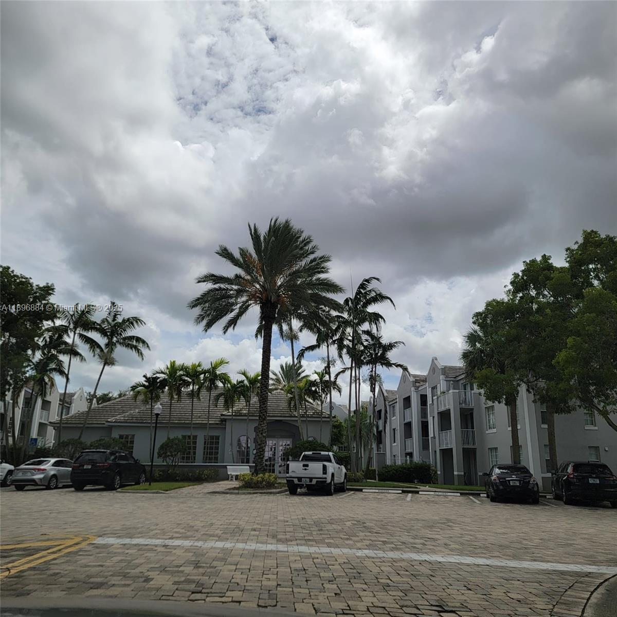 711 Southwest 111th Way, Unit 301 Pembroke Pines, FL 33025 - Photo 2 of 20 a view of a street