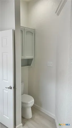 a bathroom with a toilet