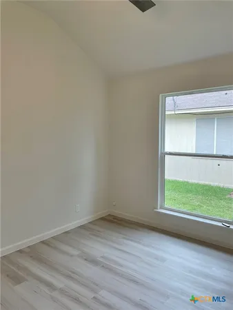 an empty room with a window