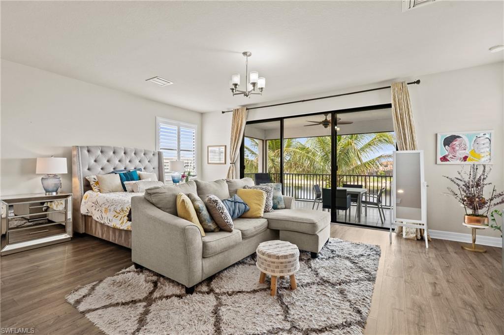 4644 Azalea Drive Naples, FL 34119 - Photo 24 of 48 a living room with furniture and a large window