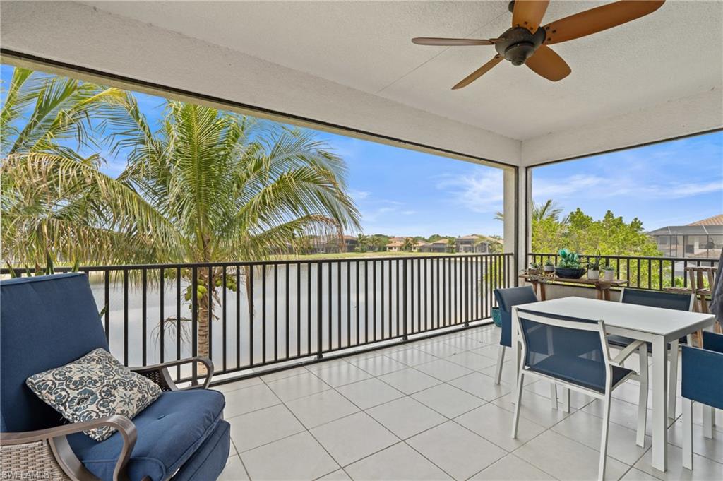 4644 Azalea Drive Naples, FL 34119 - Photo 26 of 48 a balcony with furniture and a large window