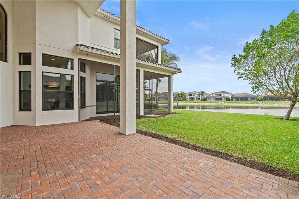 4644 Azalea Drive Naples, FL 34119 - Photo 32 of 48 a view of a house with a yard