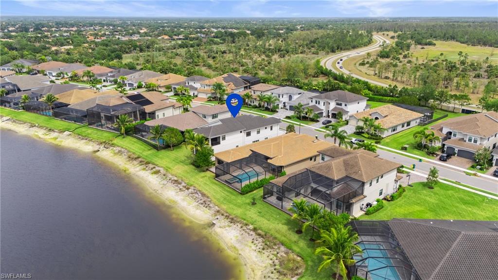 4644 Azalea Drive Naples, FL 34119 - Photo 33 of 48 an aerial view of a city with lots of residential buildings