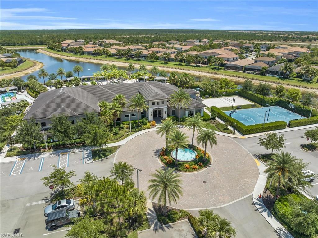4644 Azalea Drive Naples, FL 34119 - Photo 35 of 48 an aerial view of residential houses with outdoor space and seating