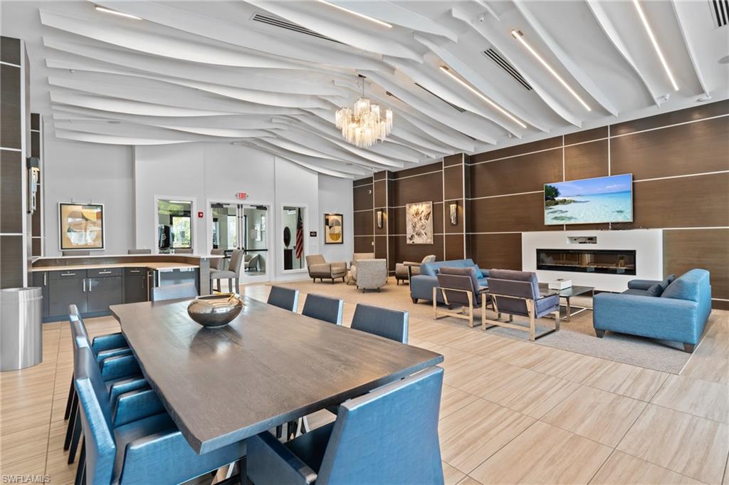 4644 Azalea Drive Naples, FL 34119 - Photo 36 of 48 a view of a dining room with furniture