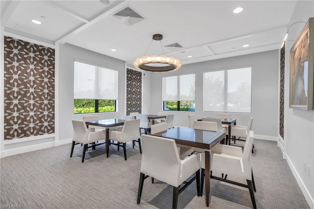 4644 Azalea Drive Naples, FL 34119 - Photo 37 of 48 a dining room with furniture and window