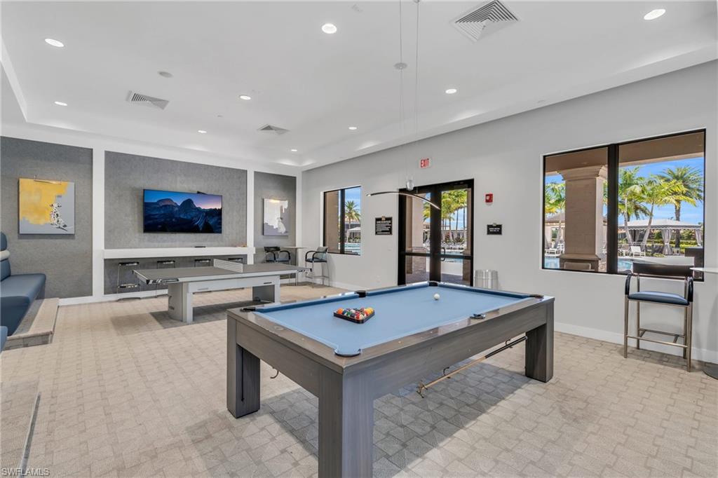 4644 Azalea Drive Naples, FL 34119 - Photo 38 of 48 a living room with table tennis and table
