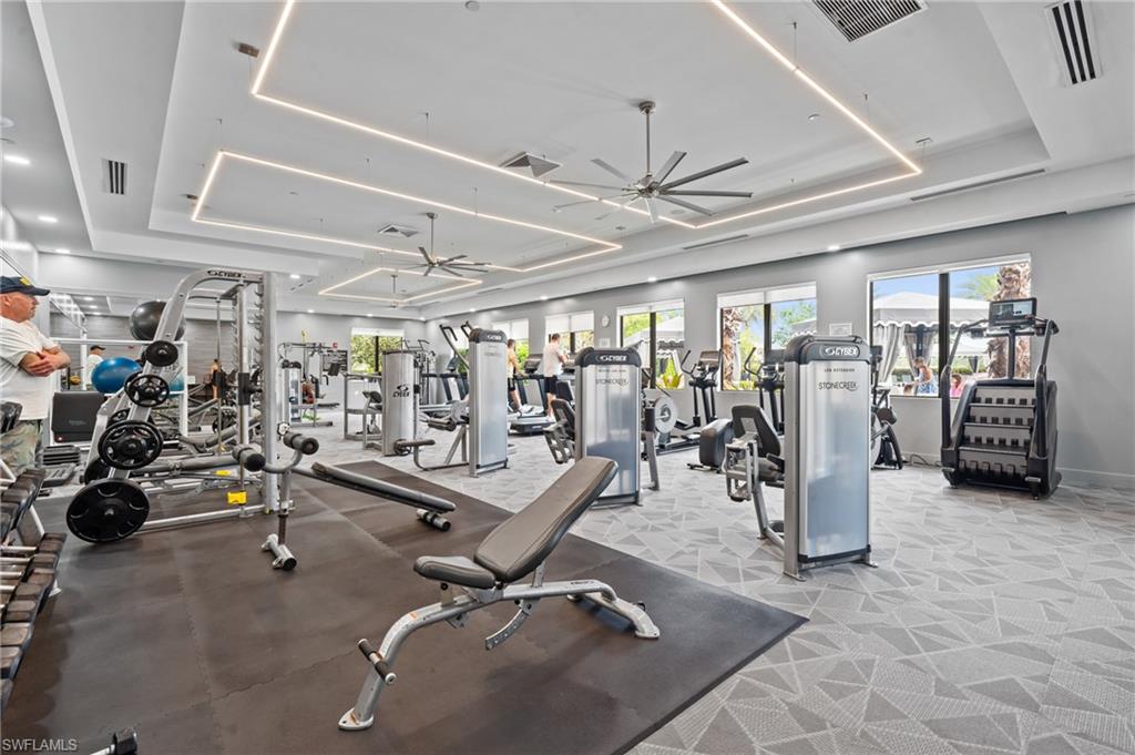 4644 Azalea Drive Naples, FL 34119 - Photo 39 of 48 a view of a room with gym equipment