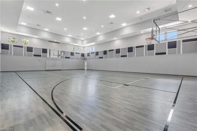a view of a water heater room with a wooden floor