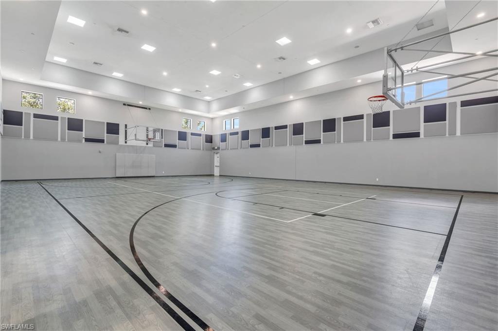 4644 Azalea Drive Naples, FL 34119 - Photo 41 of 48 a view of a water heater room with a wooden floor