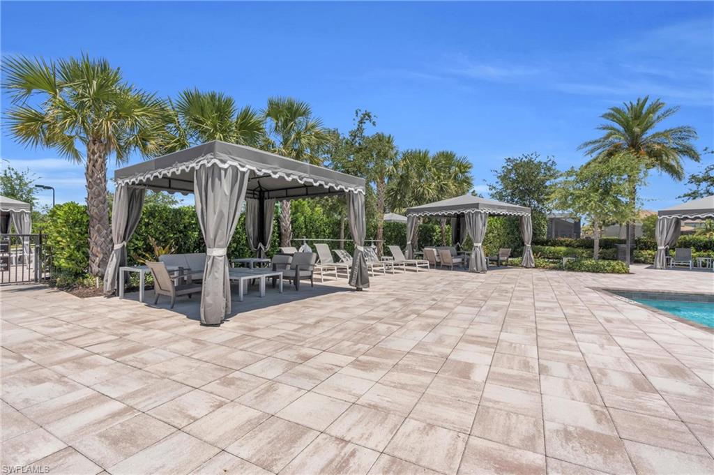 4644 Azalea Drive Naples, FL 34119 - Photo 43 of 48 a view of house with yard outdoor seating and entertaining space