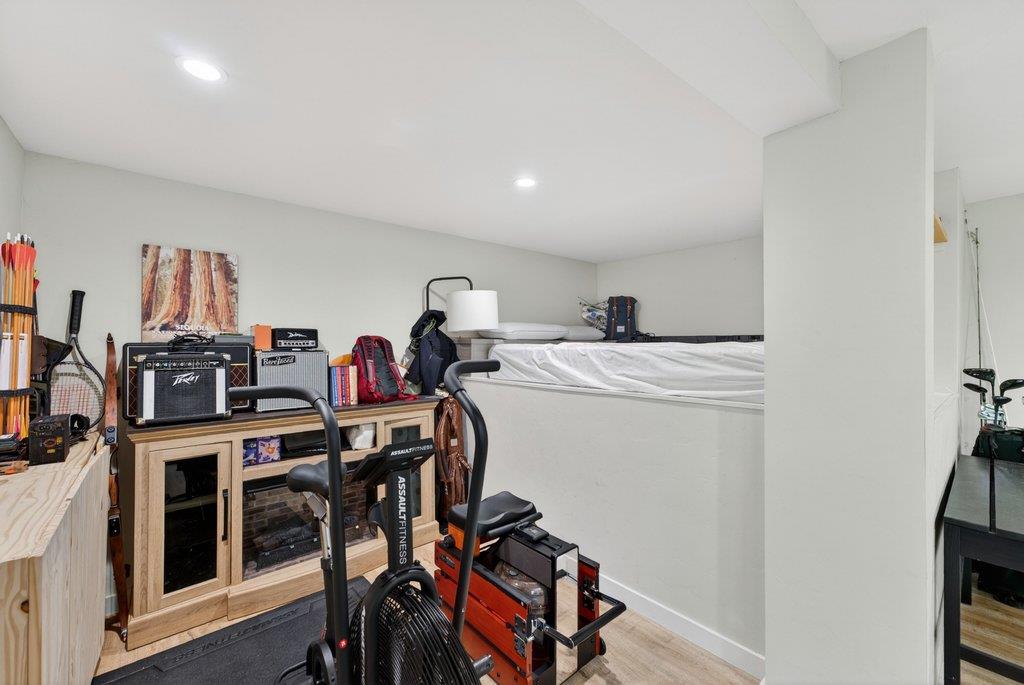 125 Shadowbrook Road Ben Lomond, CA 95005 - Photo 44 of 60 a view of a workspace with furniture and wooden floor