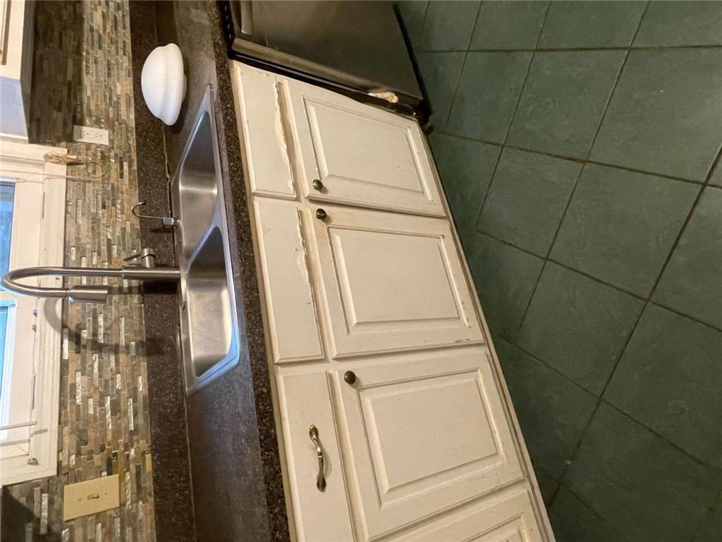 3409 Salem Road Covington, GA 30016 - Photo 14 of 16 a close view of sink and tap