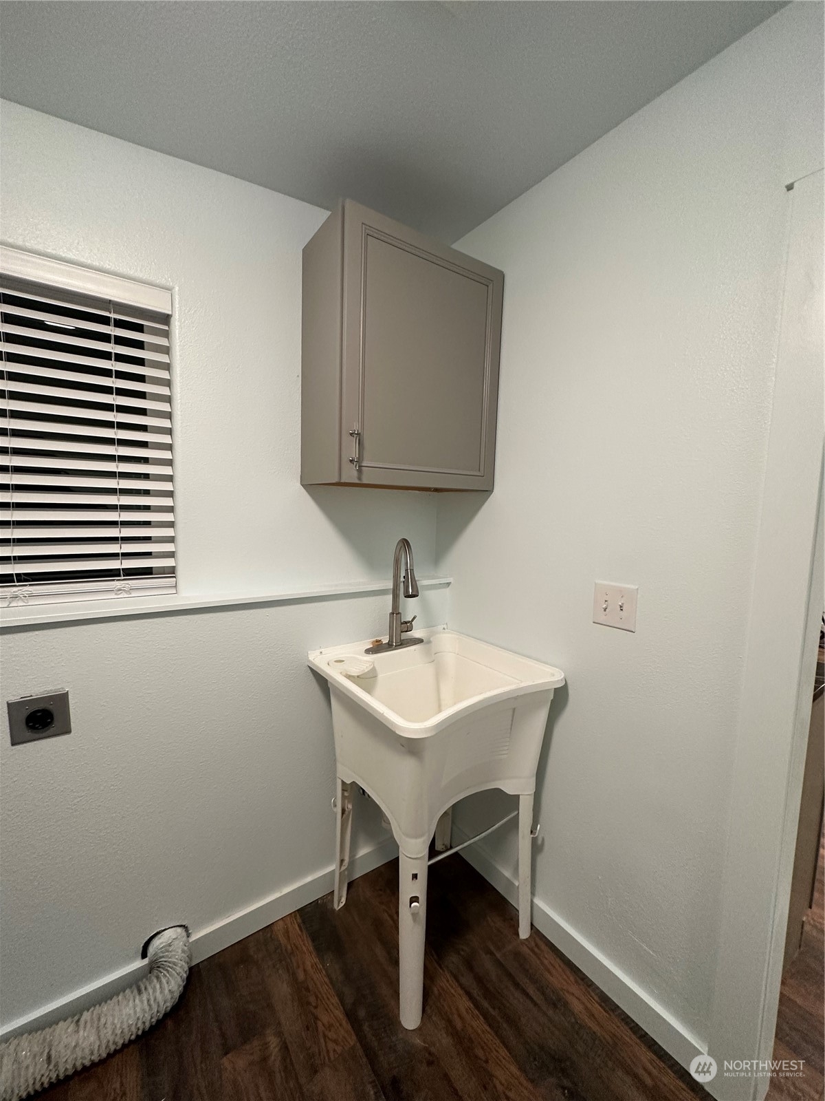 4520 Eels Road Cashmere, WA 98815 - Photo 8 of 17 a white sink sitting under a bathroom mirror