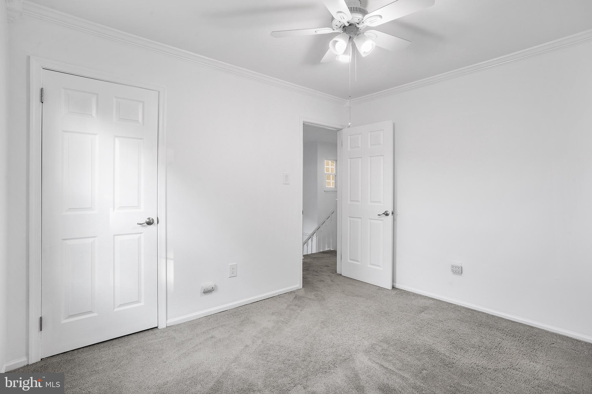16 Carlyle Court Robbinsville, NJ 08691 - Photo 28 of 30 a view of an empty room and chandelier fan