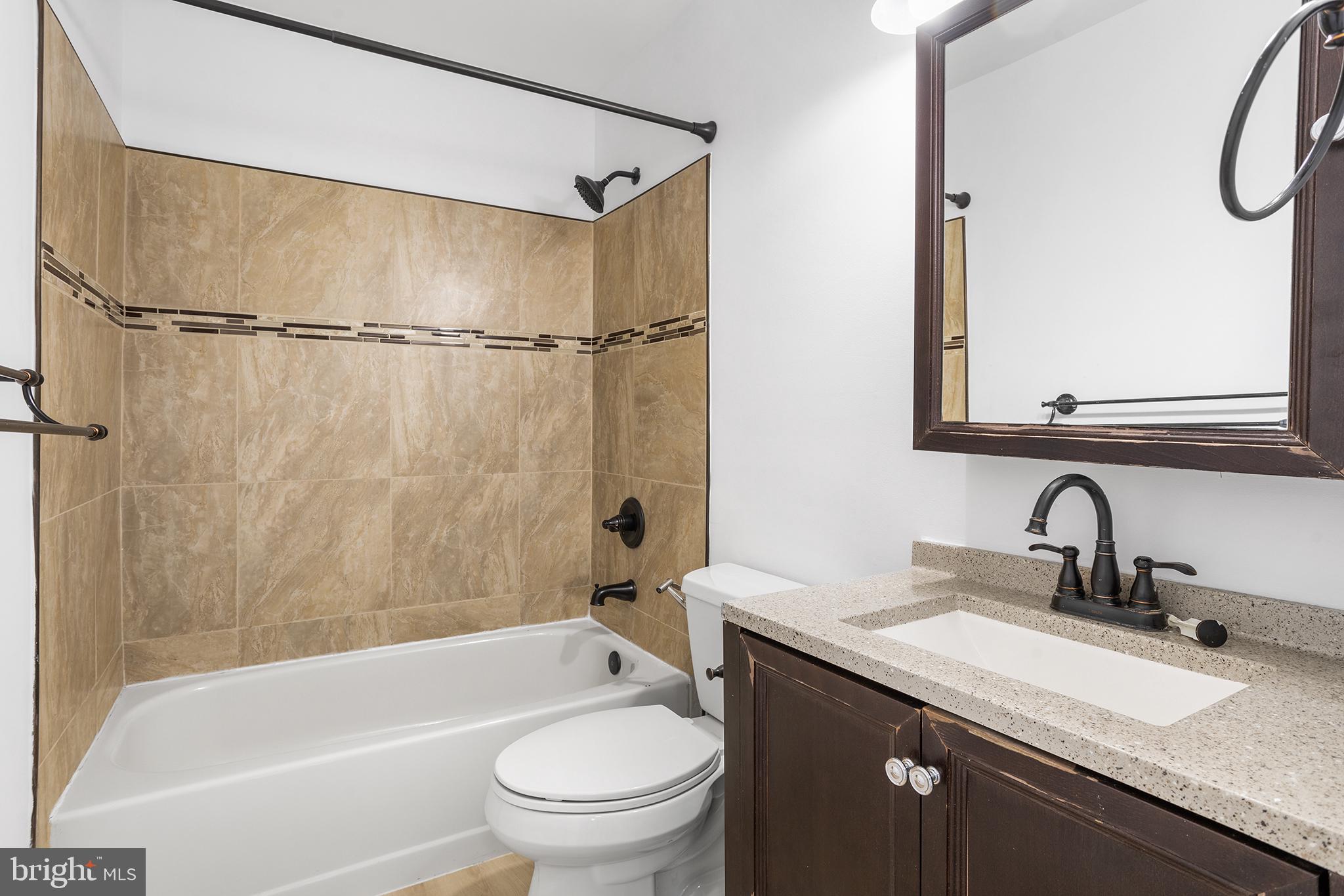 16 Carlyle Court Robbinsville, NJ 08691 - Photo 29 of 30 a bathroom with a granite countertop sink mirror toilet and bathtub