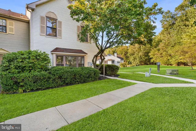 a view of a house with a big yard