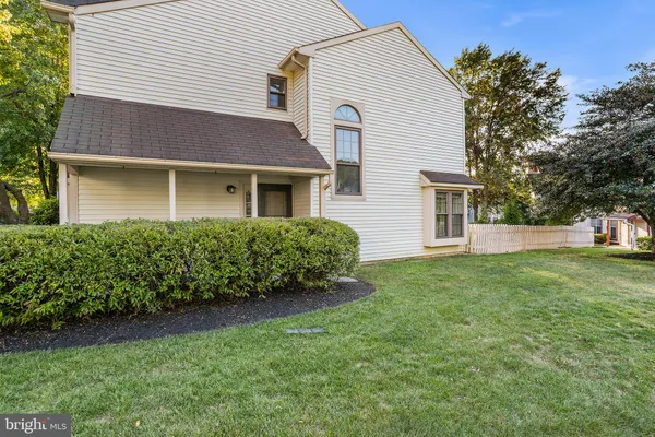 a house view with a garden space