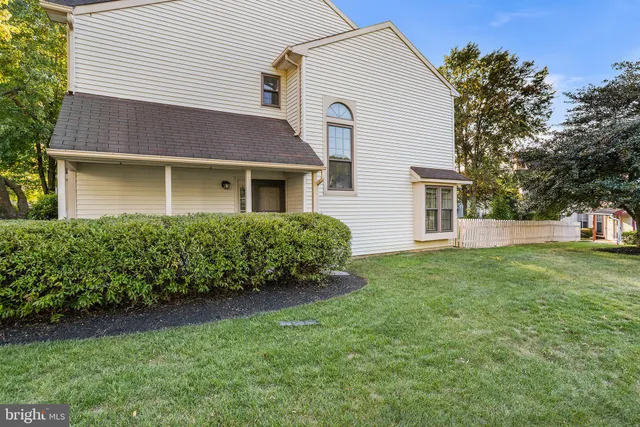 a house view with a garden space