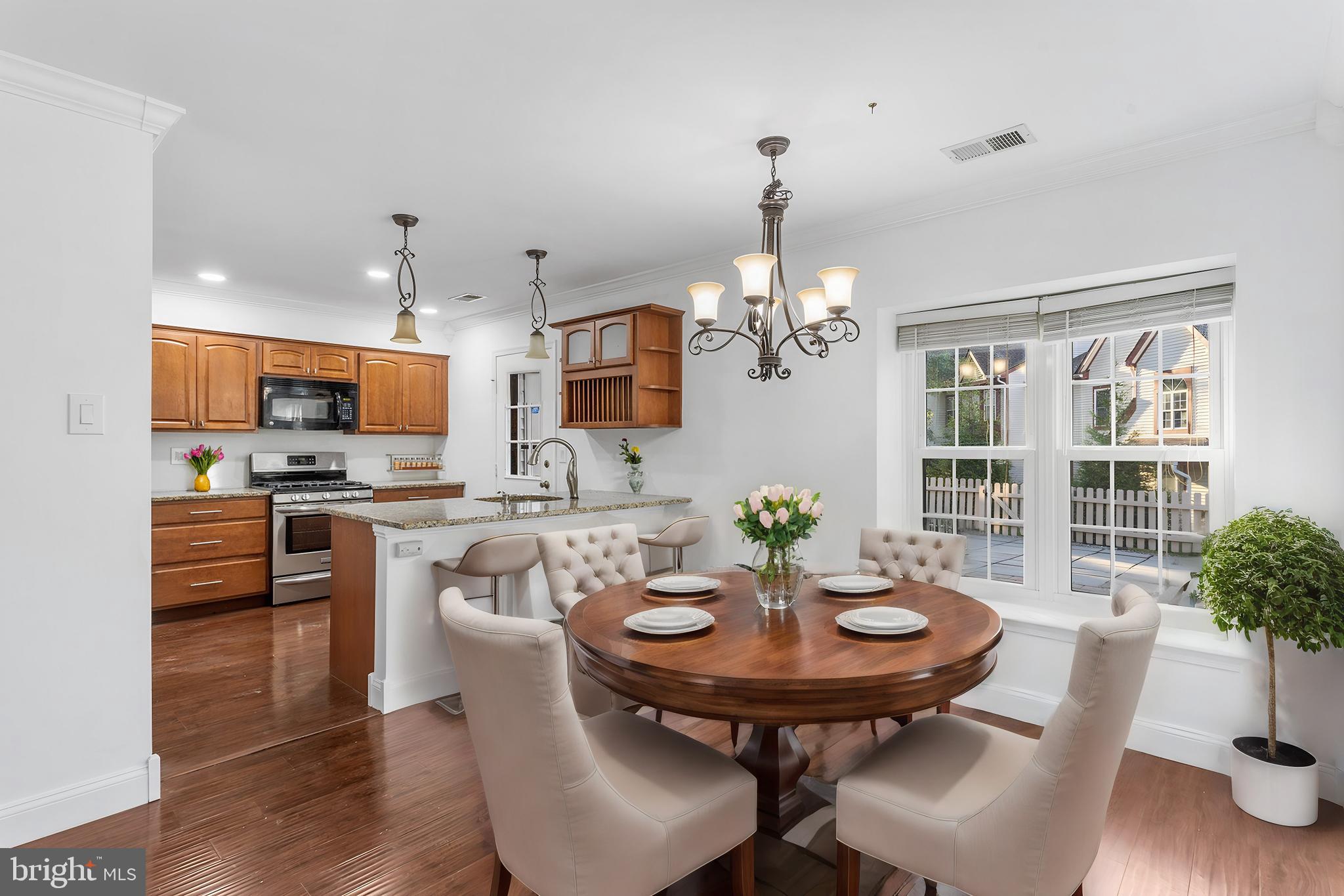 16 Carlyle Court Robbinsville, NJ 08691 - Photo 9 of 30 a view of a dining room with furniture window and wooden floor