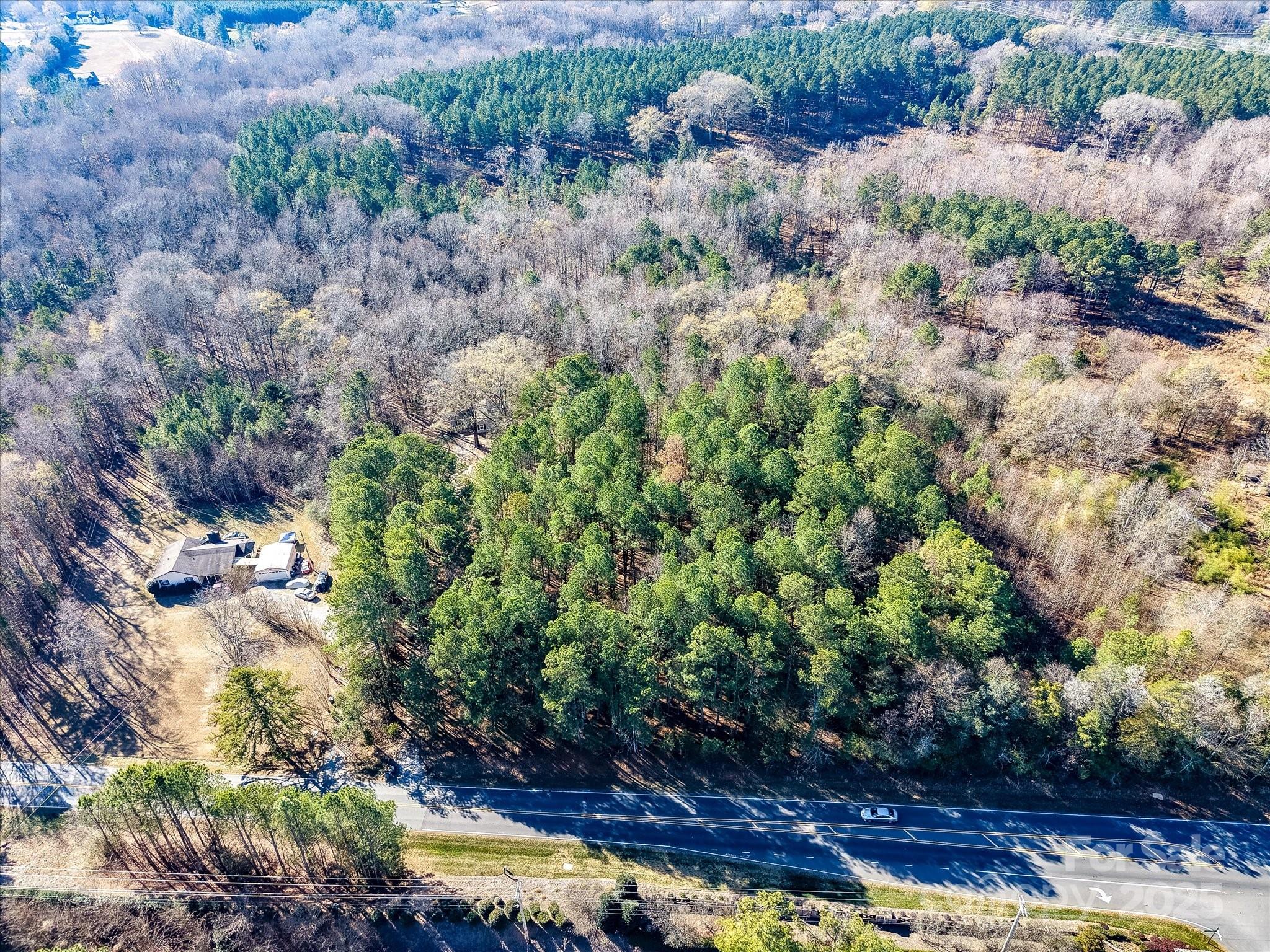 Tbd Weddington Road Matthews, NC 28104 - Photo 14 of 14 a view of a wooden house with a yard