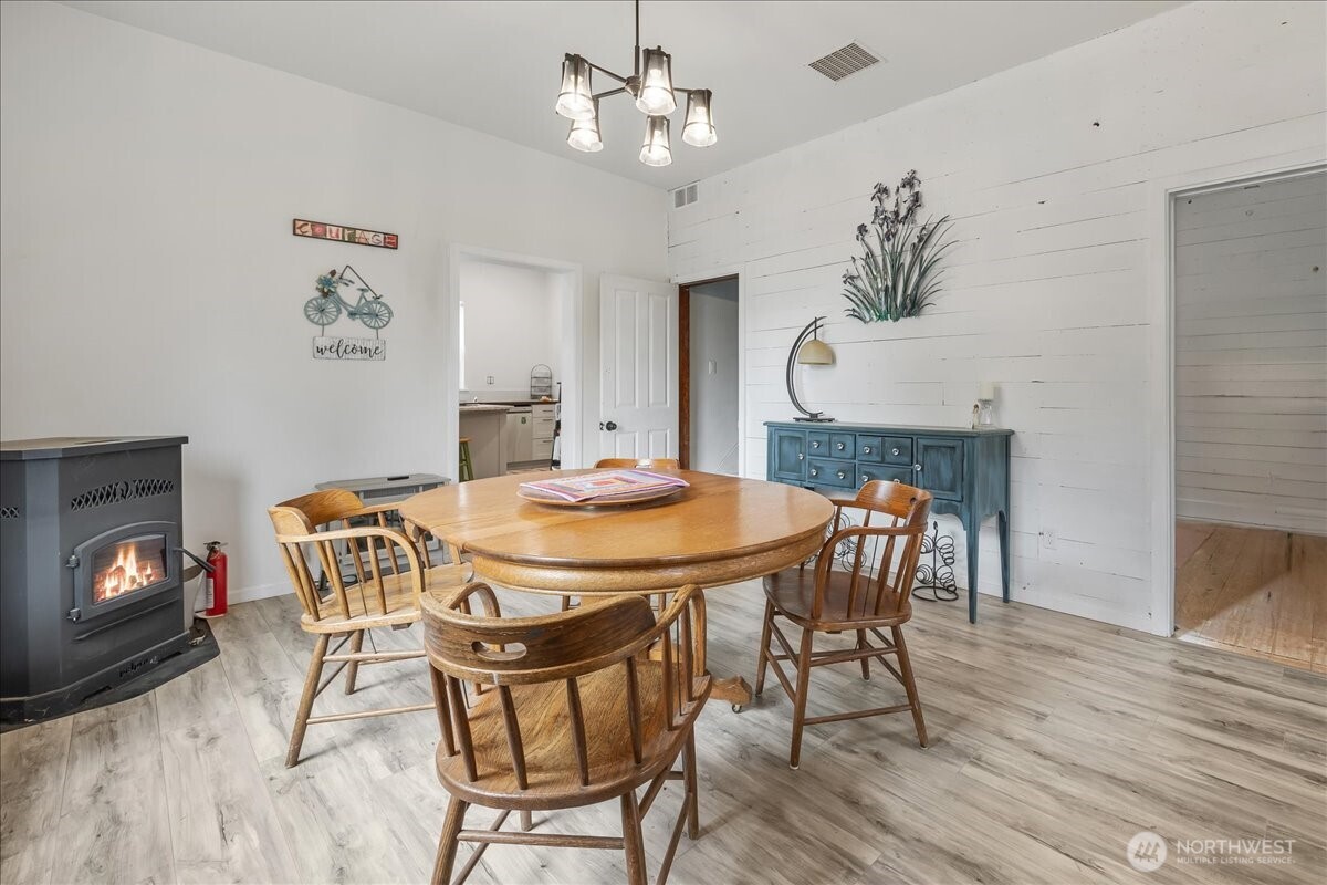 515 North 3rd Street Dayton, WA 99328 - Photo 6 of 31 a view of a dining room with furniture and wooden floor