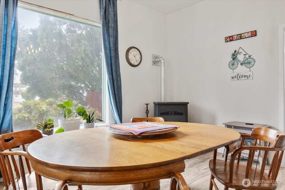 515 North 3rd Street Dayton, WA 99328 - Photo 7 of 31 a view of a dining room with furniture and a window