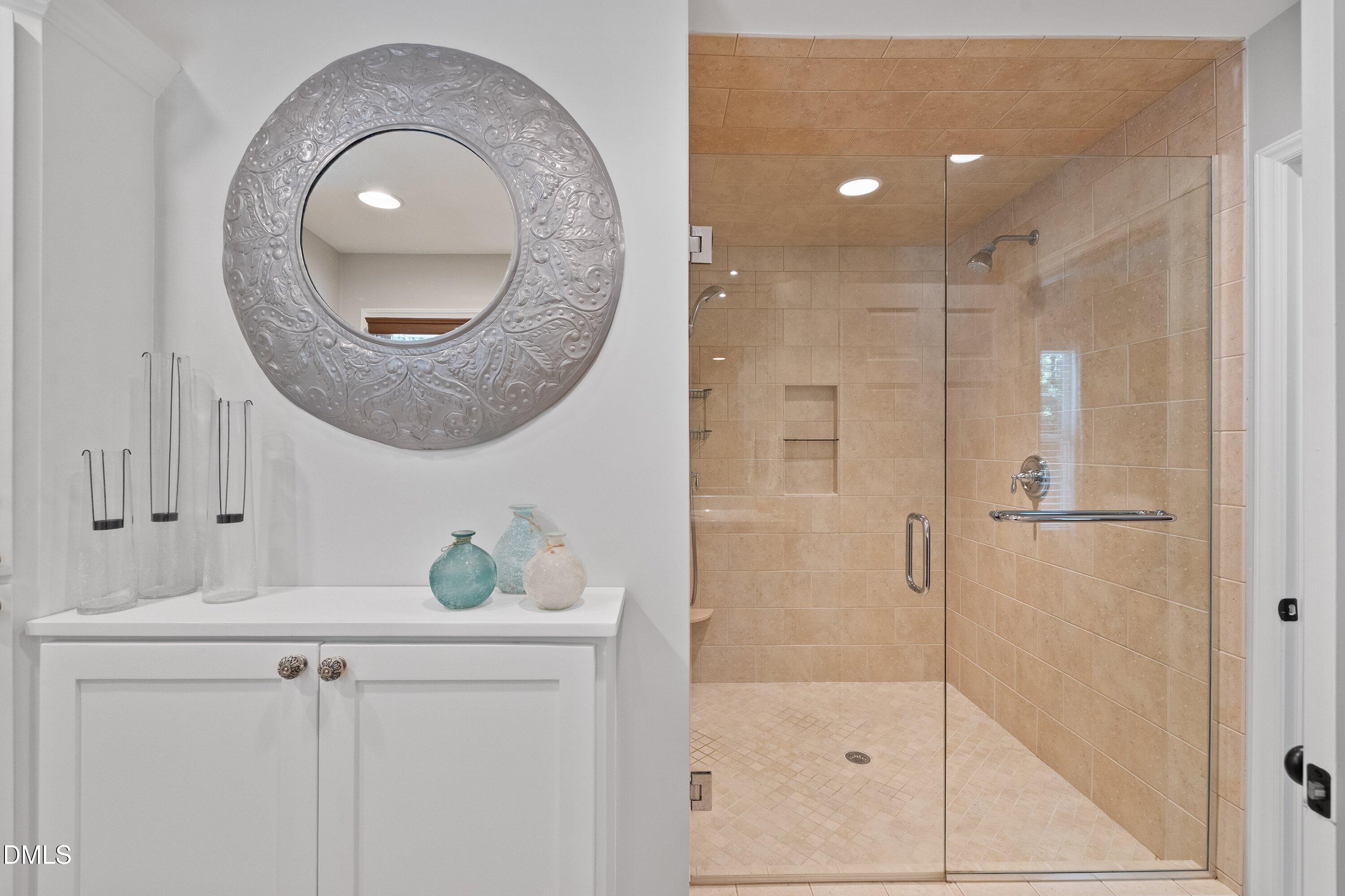 6540 Wynbrook Way Raleigh, NC 27612 - Photo 21 of 47 Primary bathroom with walk-in shower.