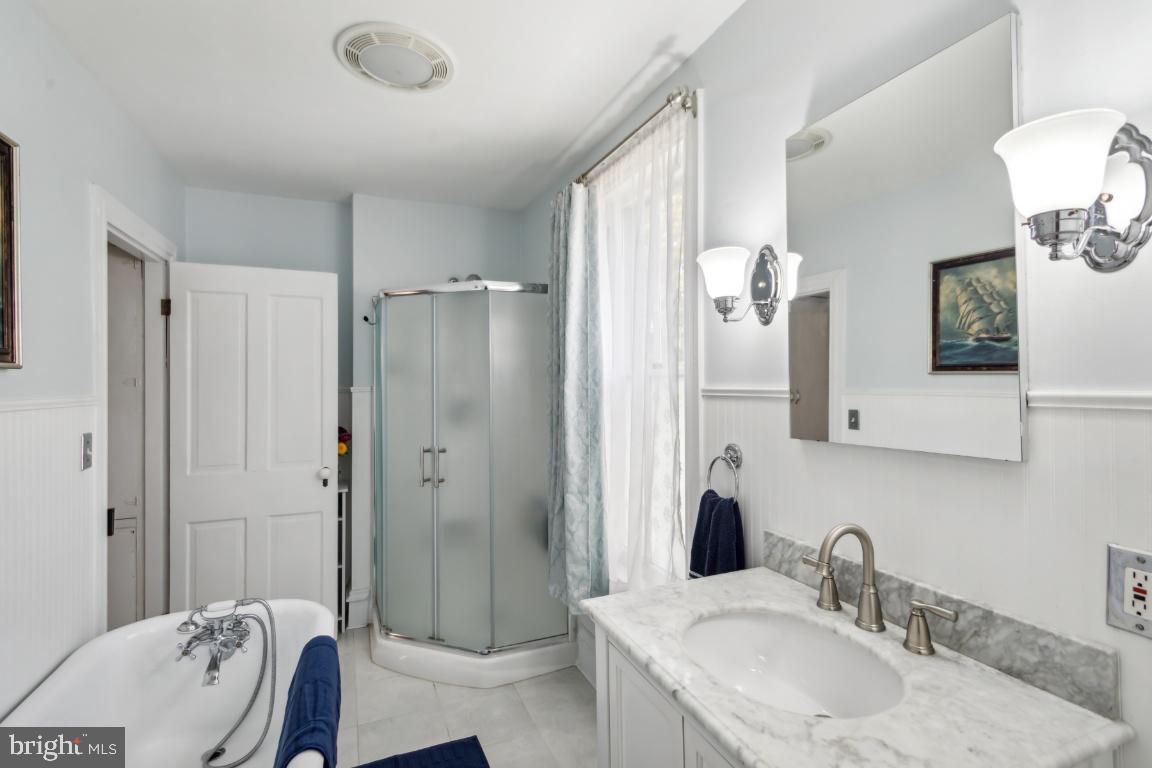 503 Kings Highway Mickleton, NJ 08056 - Photo 22 of 26 a bathroom with a granite countertop sink mirror and shower