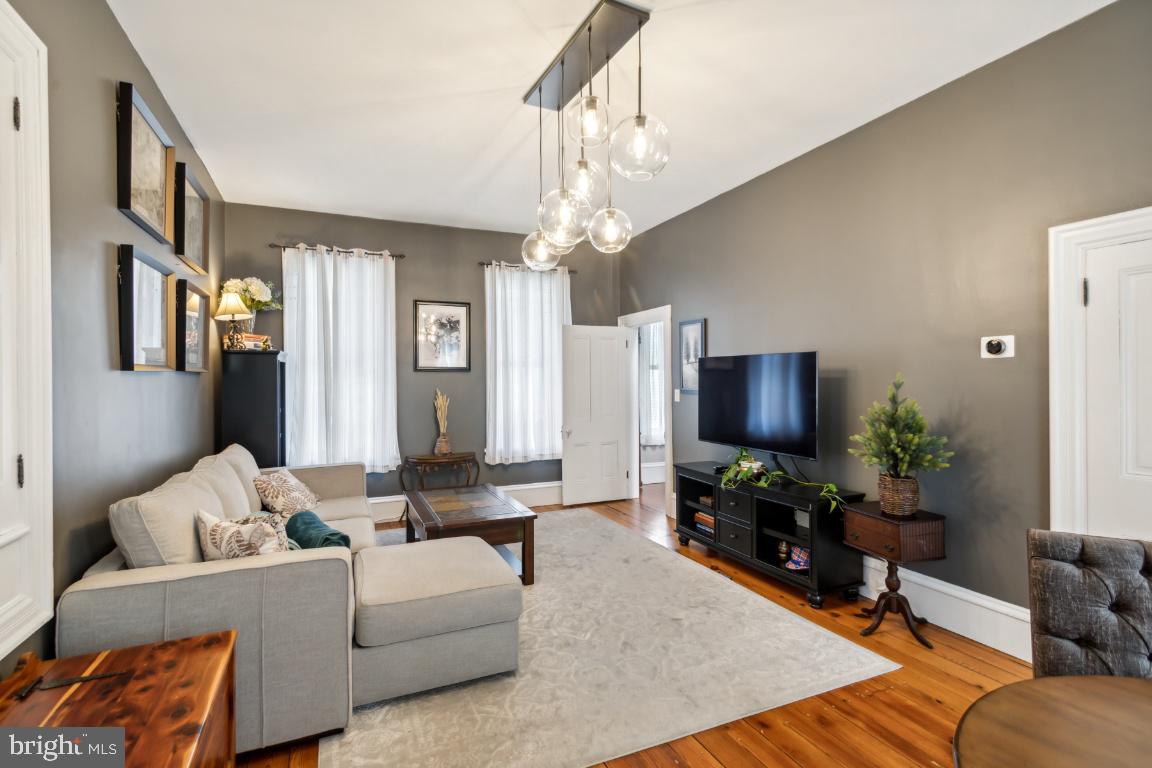 503 Kings Highway Mickleton, NJ 08056 - Photo 7 of 26 a living room with furniture a large window and a flat screen tv