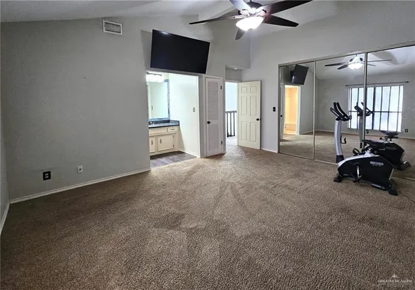 a view of a livingroom with a flat screen tv