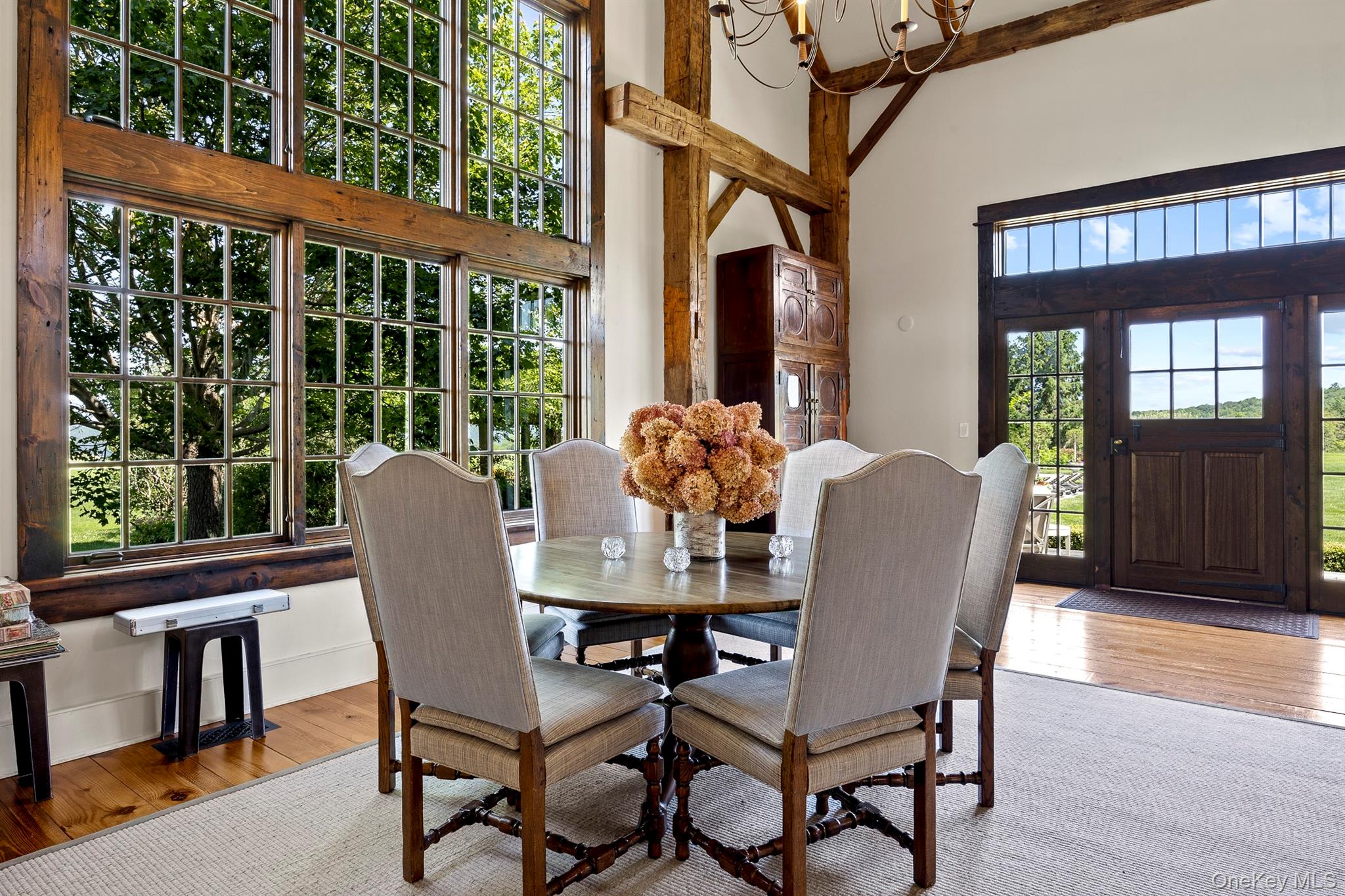 147 Moadock Road Millerton, NY 12546 - Photo 23 of 48 a dining room with furniture window and wooden floor