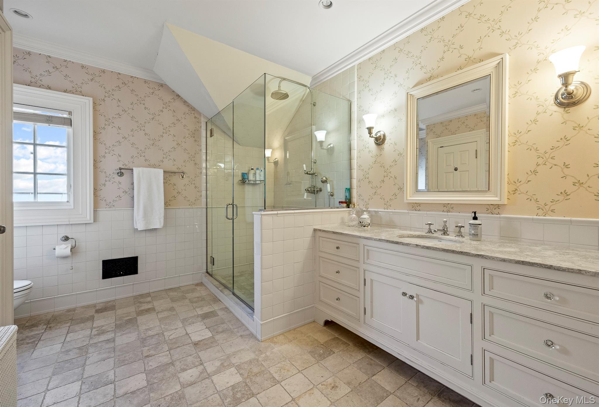 147 Moadock Road Millerton, NY 12546 - Photo 34 of 48 a spacious bathroom with a granite countertop sink a mirror a shower and a