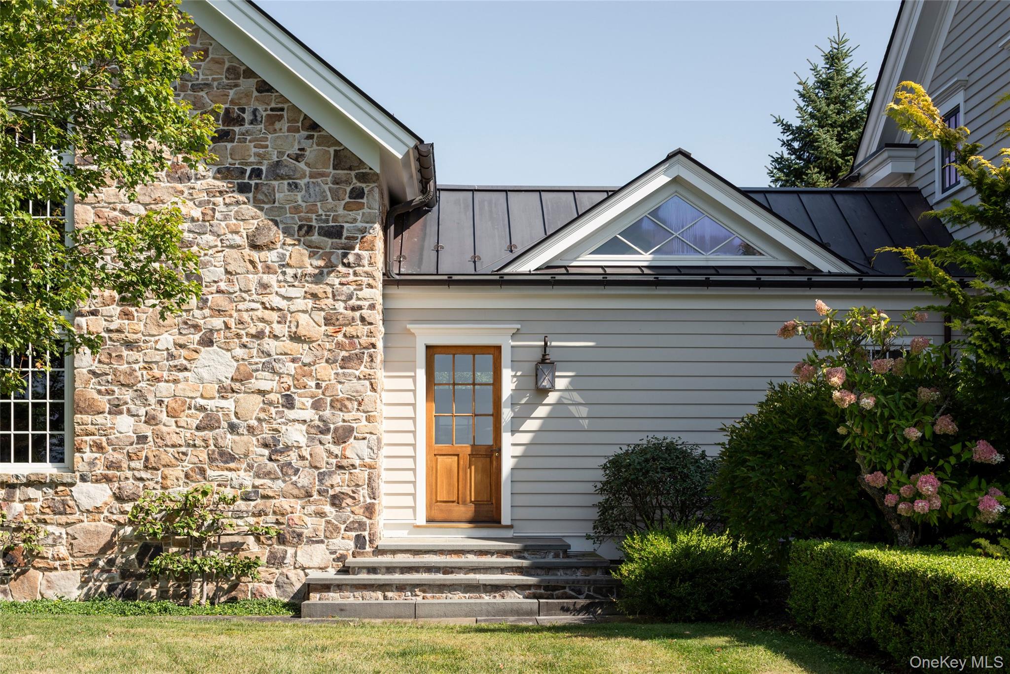 147 Moadock Road Millerton, NY 12546 - Photo 42 of 48 a front view of a house with a yard