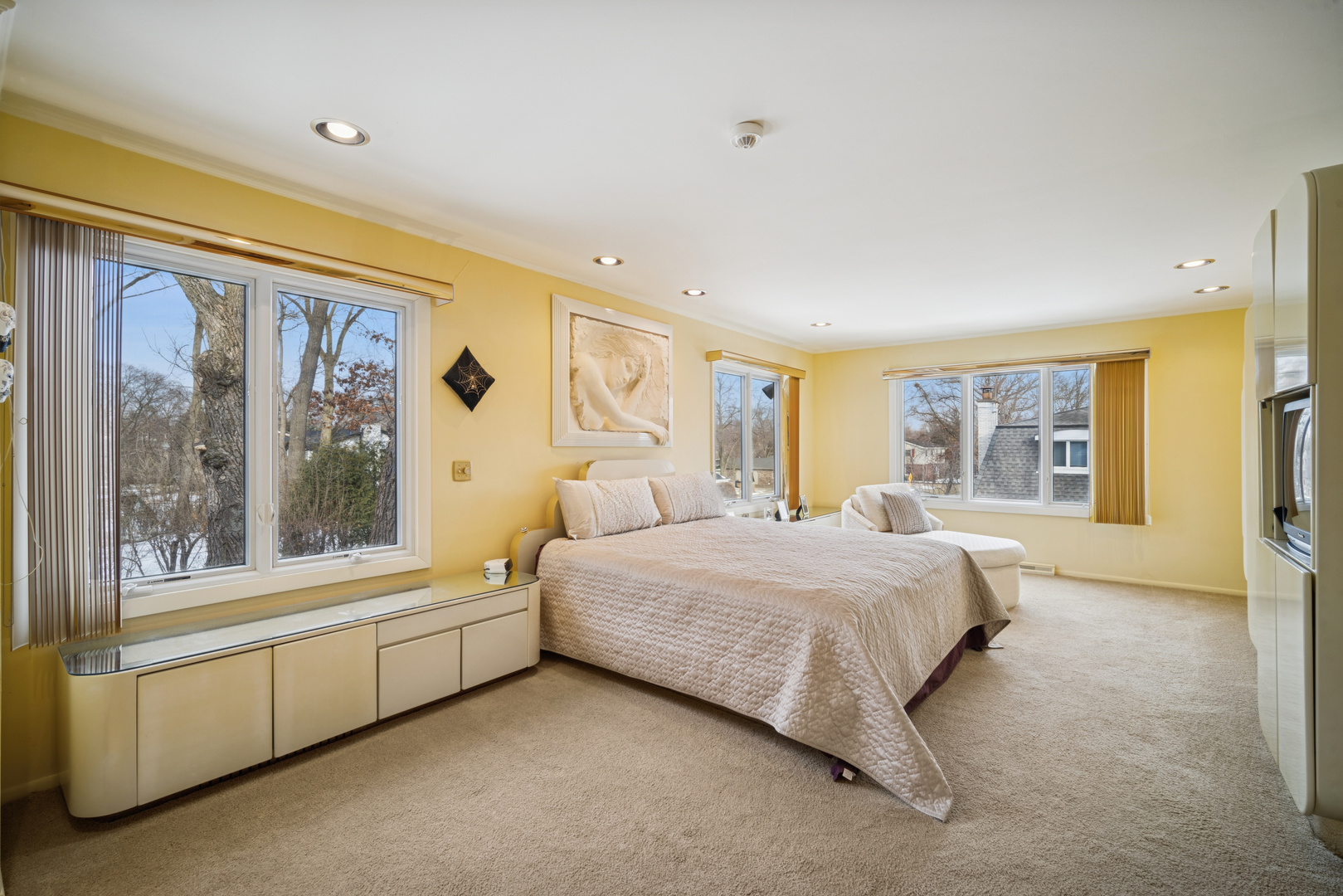 990 Heather Road Deerfield, IL 60015 - Photo 16 of 28 a spacious bedroom with a large bed and a large window