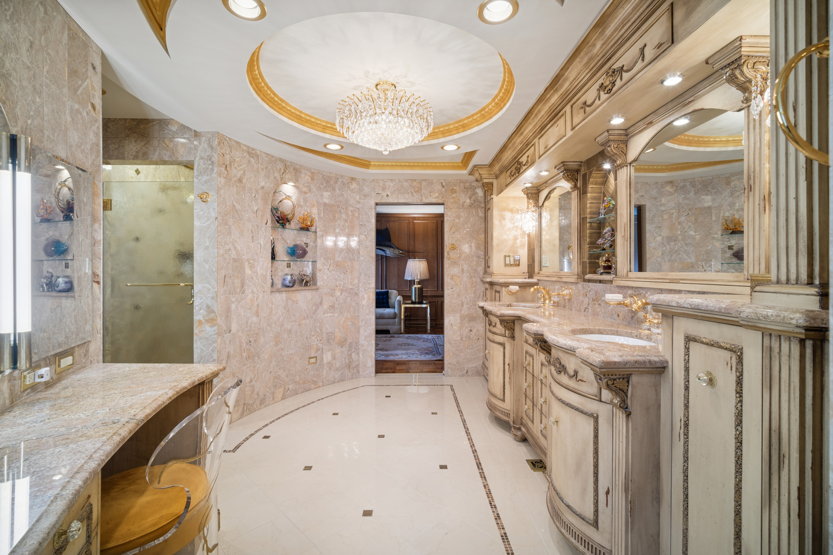 990 Heather Road Deerfield, IL 60015 - Photo 17 of 28 a spacious bathroom with a granite countertop sink a mirror a vanity and shower