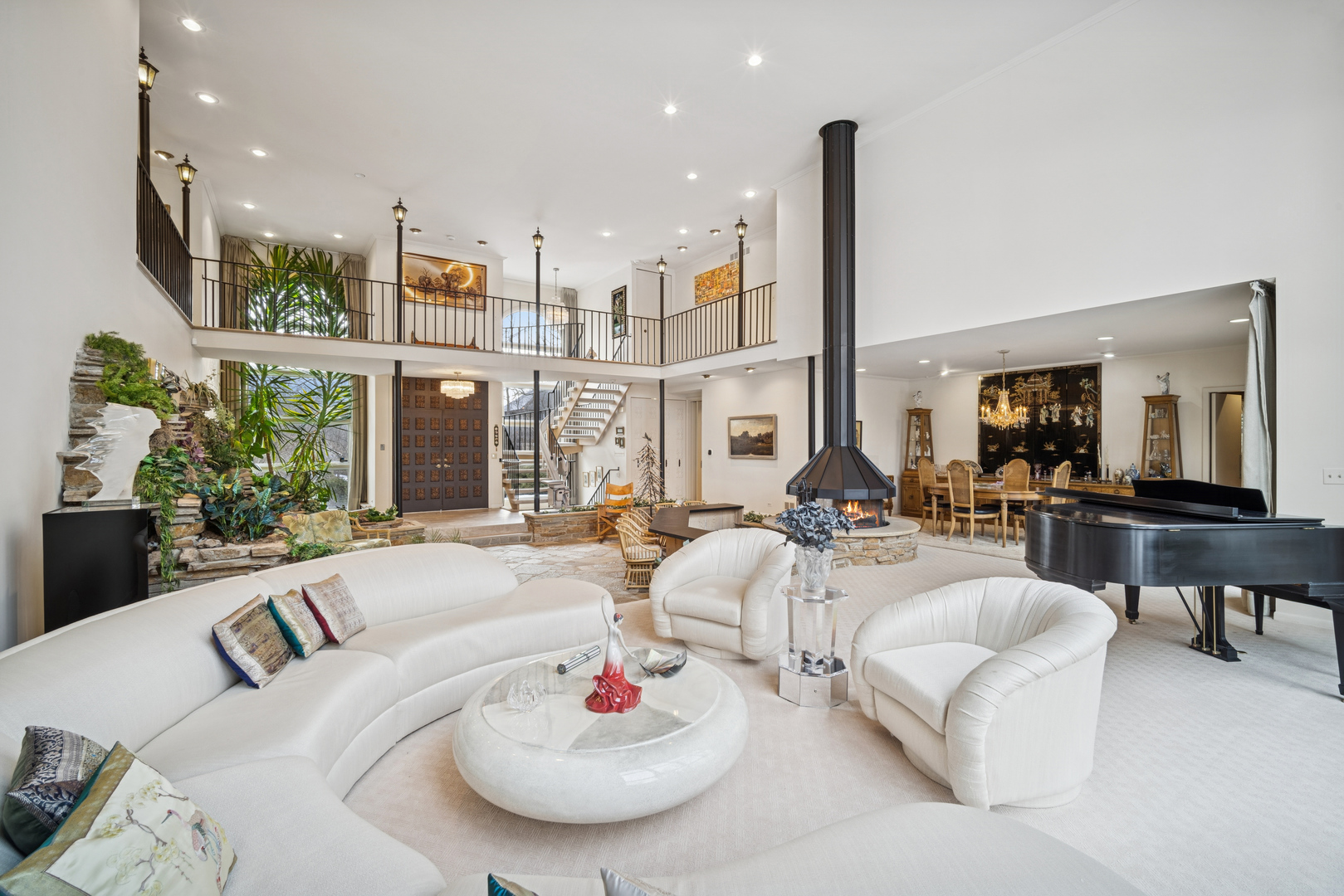990 Heather Road Deerfield, IL 60015 - Photo 10 of 28 a living room with furniture and a large window