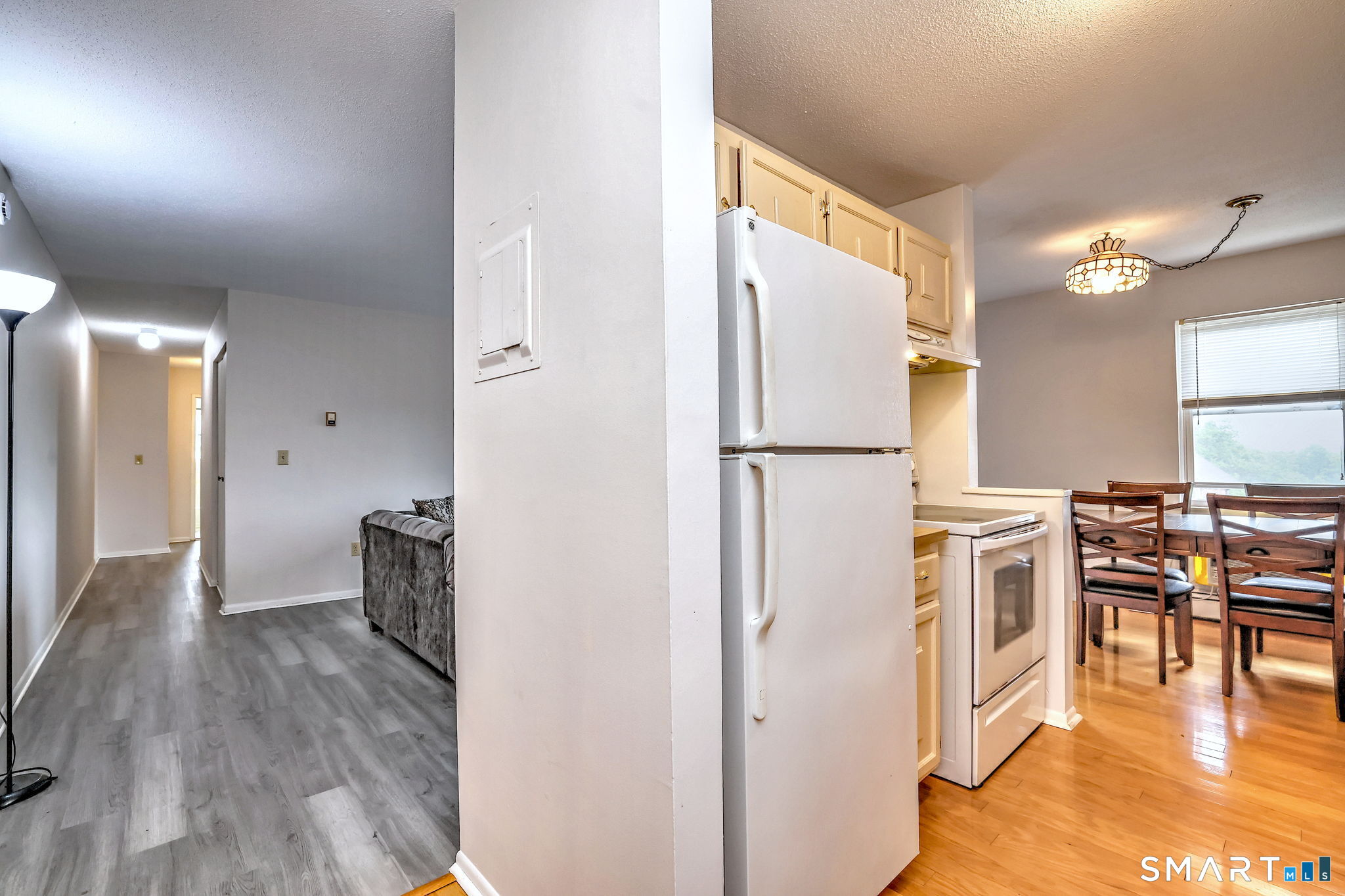 43 Balance Rock Road, Unit 11 Seymour, CT 06483 - Photo 9 of 40 a kitchen with a refrigerator and a stove top oven