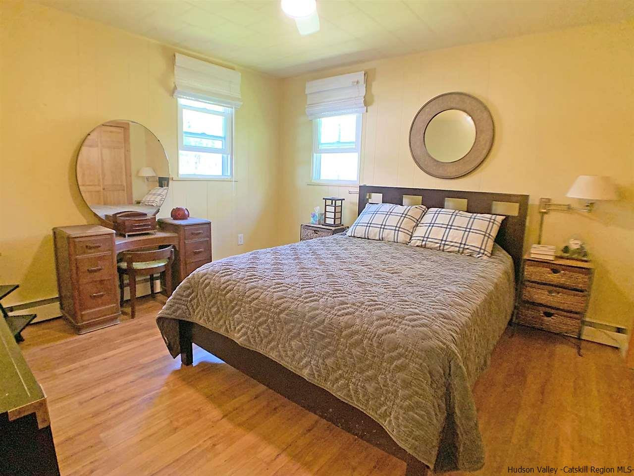 56 Bellwood Road Saugerties, NY 12477 - Photo 13 of 35 a bed sitting in a bedroom next to a window