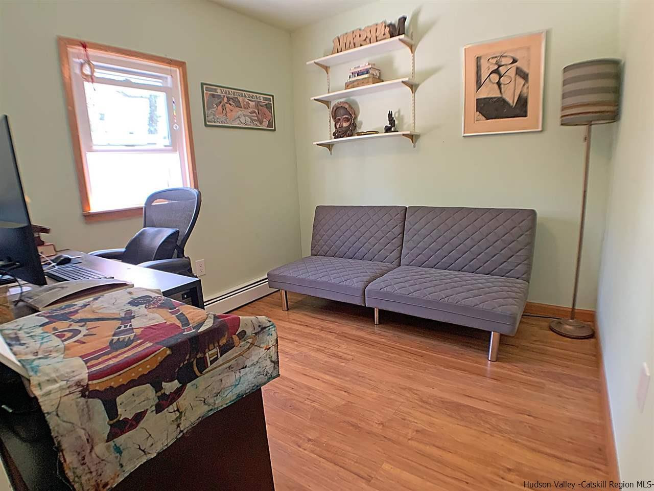 56 Bellwood Road Saugerties, NY 12477 - Photo 19 of 35 a living room with furniture and a window