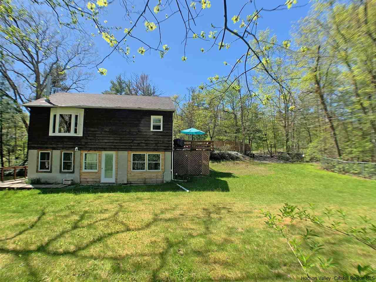 56 Bellwood Road Saugerties, NY 12477 - Photo 32 of 35 a front view of a house with garden