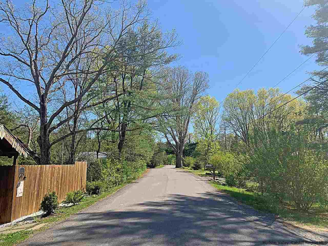 56 Bellwood Road Saugerties, NY 12477 - Photo 33 of 35 a wooden bench with view of trees