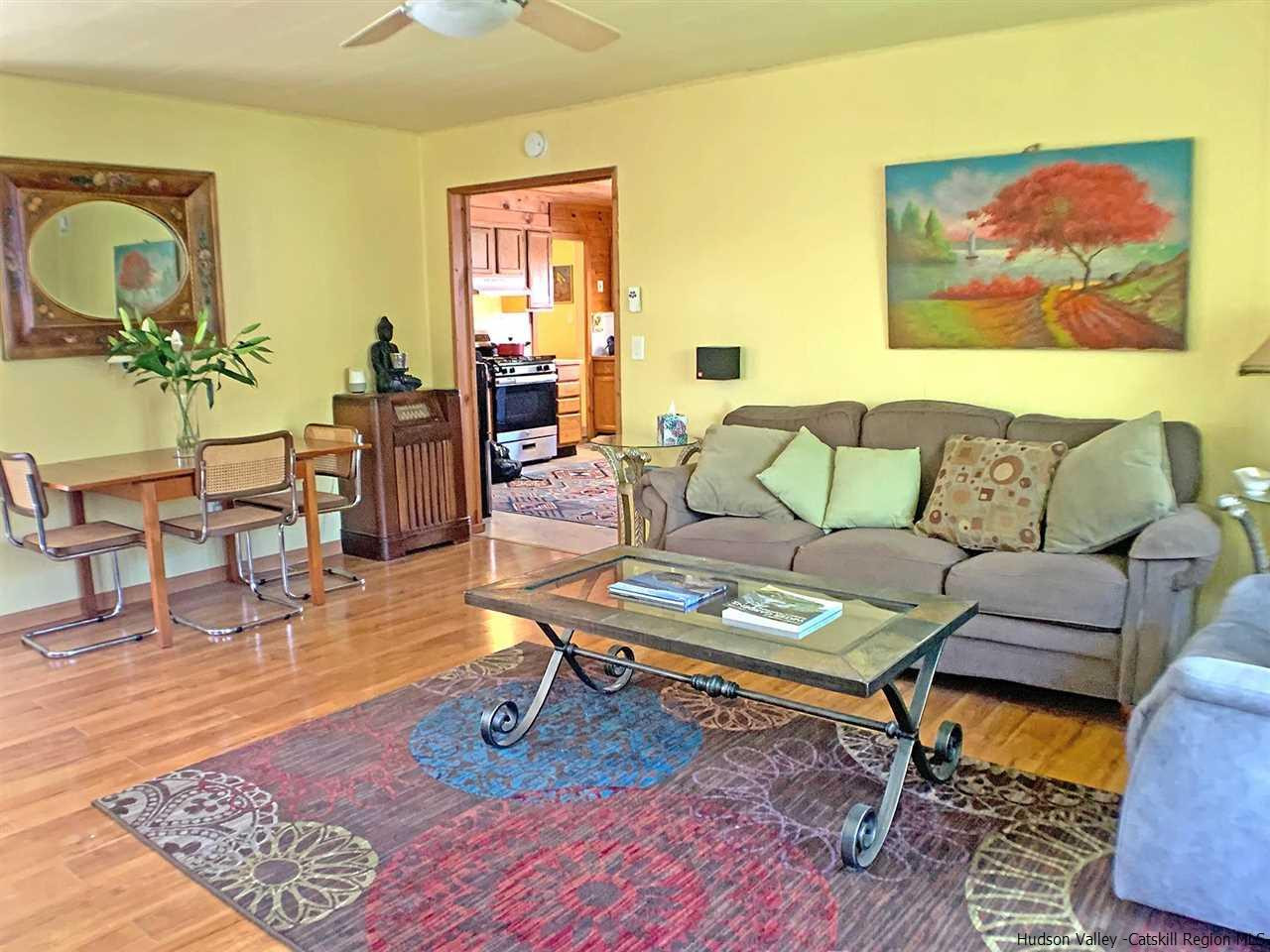 56 Bellwood Road Saugerties, NY 12477 - Photo 7 of 35 a living room with furniture and a rug