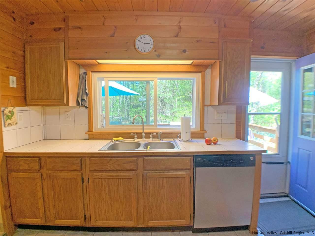 56 Bellwood Road Saugerties, NY 12477 - Photo 9 of 35 a kitchen with sink and window