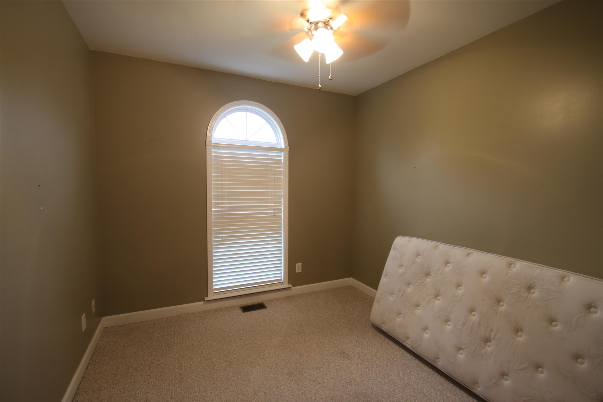 1013 Woods Ferry Road Lebanon, TN 37087 - Photo 15 of 20 a view of an empty room with a window
