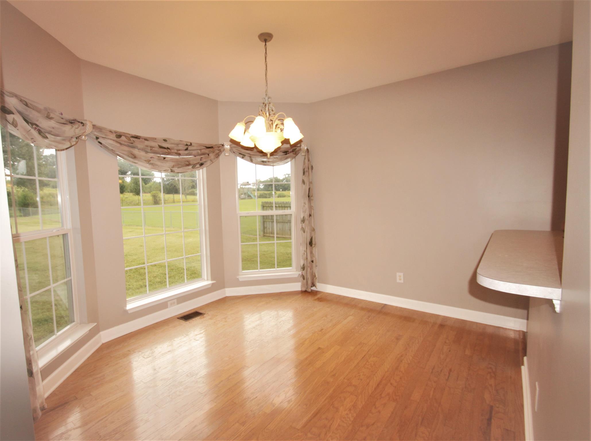 1013 Woods Ferry Road Lebanon, TN 37087 - Photo 6 of 20 a view of an empty room with a window