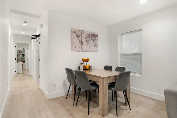 a view of a dining room with furniture